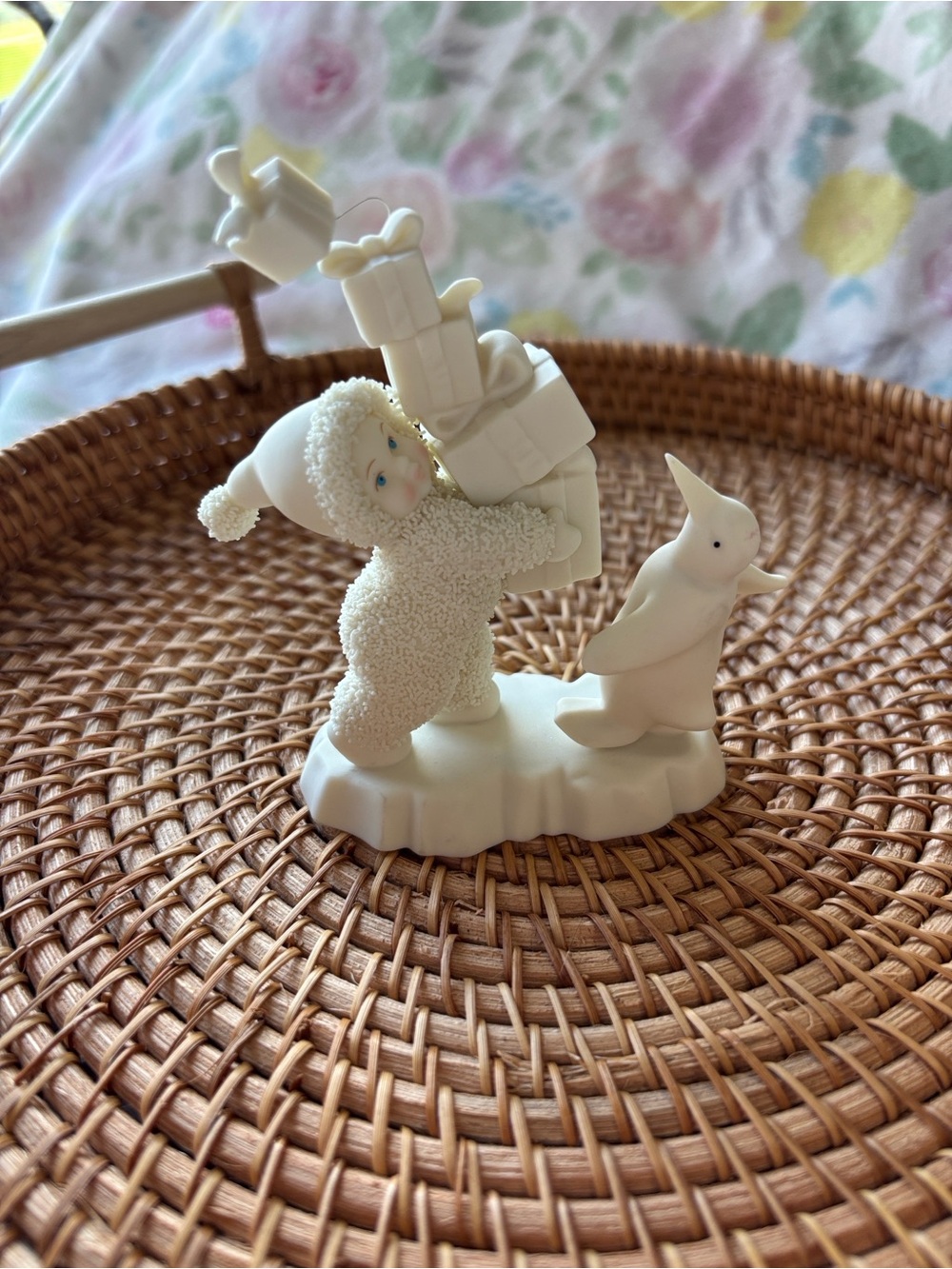 Department 56 Cream and White Child Figurine Carrying Gifts with Penguin